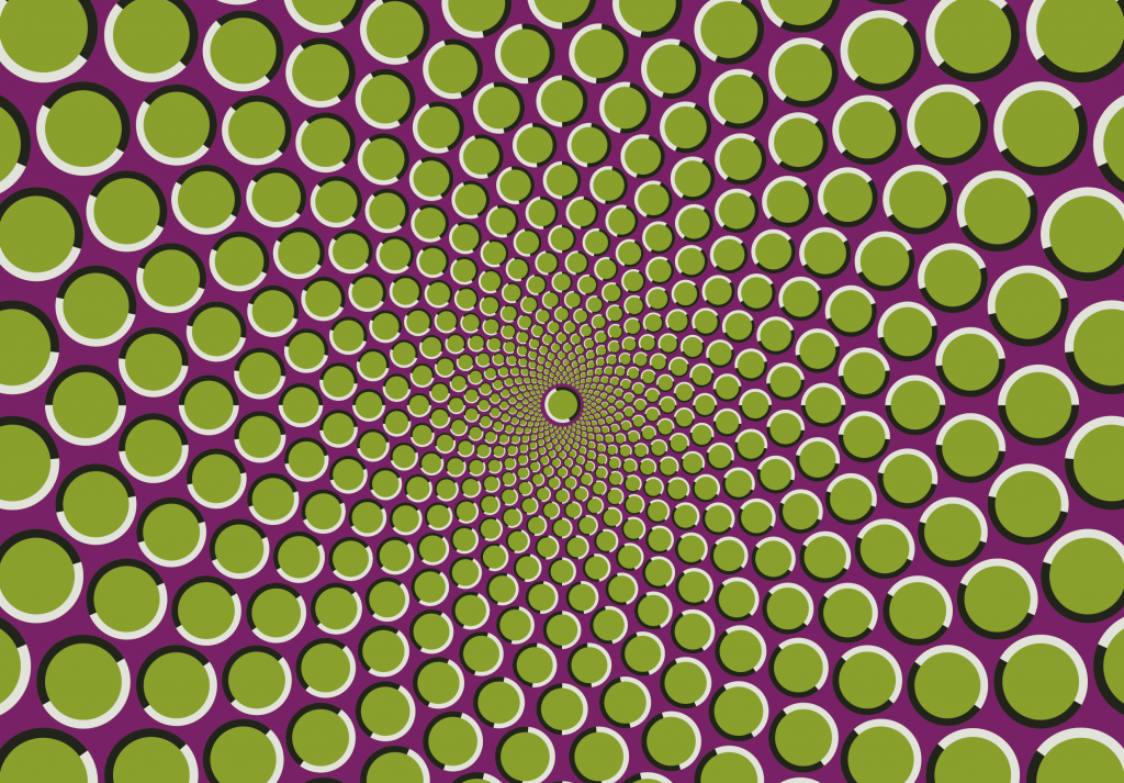purple and green optical illusion created by a spiral pattern of dots