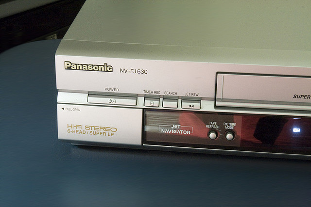 Your parents or grandparents might still use a videocassette recorder (VCR) like this.